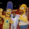 Homer Simpson and Marge Simpson hanging out with PORTOMAN sharing in the fun of the beer festival!