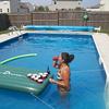 Playing beer pong poolside is always fun!
